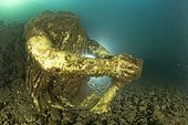Statue of Ulysses with a cup of wine, is located in the submerged Nymphaeum of Emperor Claudius, near Punta Epitaffio , Marine Protected Area of Baia, Naples, Italy, Tyrrhenian Sea