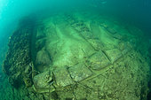 Mosaic covered with cloth and sandbags to protect it from storm surges, located in the submerged Nymphaeum of Emperor Claudius, near Punta Epitaffio , Marine Protected Area of Baia, Naples, Italy, Tyrrhenian Sea