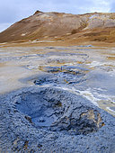 Mudpot or mud pool, geothermal area Hveraroend or Namaskard. Landscape at lake Myvatn. Europe, Northern Europe, Iceland