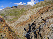 Bridge Piccard Bruecke close to glacier Gurgler Ferner. The bridge was necessary due to the retreating Gurgler Ferner as the old path used the surface of the glacier. Oetztal Alps in the nature park Oetztal near village Obergurgl. Europe, Austria, Tyrol