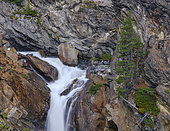 Waterfall Rotmooswasserfall in the Oetztal Alps in the nature park Oetztal near village Obergurgl. Europe, Austria, Tyrol