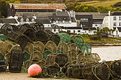 Shellfish traps in front of the harbour of Craighouse, the only township on the island of Jura, Scotland.