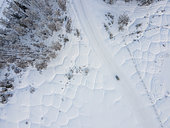 Aerial view of the modification of the landscape following the degradation of permafrost and the appearance of earthen mounds following a polygon subsidence, Dikimdya, Republic of Sakha, Russia