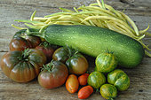 Harvest from the vegetable garden: courgette (Cucurbita pepo), butter beans (Phaseolus vulgaris), tomatoes (Solanum lycopersicum)