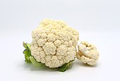 Raw cauliflower on a light background. Natural product. Natural hue. Close-up.