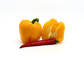Composition of yellow and red sweet peppers of different sizes on a light background. Natural product. Natural color. Close-up.
