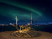Solfar, a landmark of Reykjavik. Solfar, a landmark of Reykjavik. Solfar icelandic for Sun Voyager is a sculture made of stainless steel in the harbour of Reykjavik made be the artist Jon Gunnar Arnason. Night shot with northern lights. europe, northern europe, iceland, February