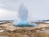 Geothermal area in the Haukadalur, Iceland. The geothermal area Haukadalur part of the touristic route Golden Circle during winter. Geysir Strokkur. europe, northern europe, iceland, March