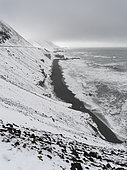 Coastline in the eastern fjords in Iceland. Coastline near Lon during storm in winter in the eastern fjords near Djupivogur. europe, northern europe, iceland, February