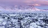 Lava field Dimmuborgir during winter near Myvatn, Iceland. Lava field Dimmuborgir during winter near lake Myvatn in the highlands of Iceland in deep snow. View towards south into the central highland wiht mount Blafjall. europe, northern europe, iceland, February