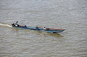 Traditional wooden boat with outboard motor on Atrato River, Quibdo, Chocó Department, Colombia, South America