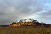 Snowy mount in autumn, Iceland.