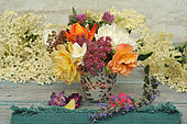 Bouquet of garden flowers: Rose, Fortune meadowsweet, Clover, Elder, Seringa