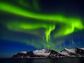 Aurora Borealis, Northern Lights over the Fjord Mefjorden with mountains, Mefjordvaer, Senja Island, Troms, Norway, Europe