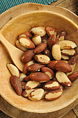 Brazil nuts, Amazon nuts or Brazil chestnuts in a wooden bowl. Source of selenium.