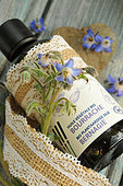 Borage oil. Borago oil (Borago officinalis) - blue flowered plant with depurative and diuretic properties, for respiratory problems, used in cosmetics for oily skin.