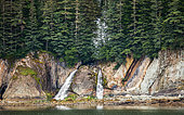Small waterfall on the coast of Alask, Alaska, USA.