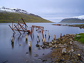 Abandoned fish factory in Eyri at fjord Ingolfsfjoerdur. The Westfjords (Vestfirdir) in Iceland during late autumn Herbst. Europe, Northern Europe, Iceland