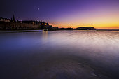 Sunset at the foot of the ramparts of Saint-Malo, Ille-et-Vilaine, Brittany, France