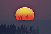 Wind turbines at sunset, Monts du Lomont, Jura, France