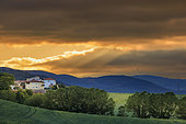 Sunset over the village of Abinzano, Sierra de Izco, province of Navarre, Spain