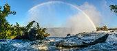 The Zambezi River and rainbow just above The Eastern Cataract. Victoria Falls. Livingstone. Zambia