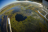 Aerial view of Okavango Delta from below a helicopter. Botswana