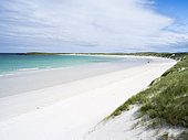 Landscape on the island of North Uist (Uibhist a Tuath) in the Outer Hebrides. Sandy beach with dunes near Solas. Europe, Scotland, June