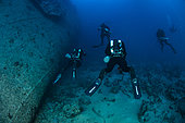 Rebreather divers exploring the SS Thistlegorm wreck a British cargo steamship built in North East England in 1940 and sunk by German bomber aircraft in 1941. Near Ras Mohammed, Sinai Peninsula, Red Sea, Egypt
