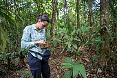 27-year-old researcher working on nitrogen exchange between bacteria and the roots of legumes in the rainforest at the "La Selva" research station in Puerto Viejo de Sarapiqui, Costa Rica