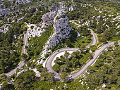 Winding road in the Alpilles mountains, Provence, France