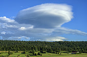 Thunderstorm cloud forming in the Jura Mountains. Mouthe area, Doubs, France