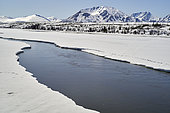 Landscape of the Alaska Range looking north Mac Laren river in the spring, after a winter of record snowfall (about 8-9 metres of snow in total). Denali highway, Alaska, USA