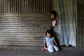 Two Rama children aged 4 and 7 at the entrance of their room. Nicaragua, San Juan de Nicaragua.