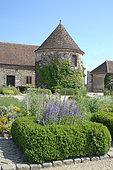 Square of Boxwood (Buxus sp) and flowers, Medieval Garden of Bois Richeux, Eure et Loir, France