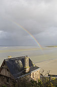 Rainbow by the bay seen from the Mont Saint Michel, France.