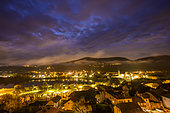 Light pollution on a small town in Haute Savoie. Seyssel, at night. Haute Savoie, France