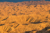 Semi-desert hills at sunset south of Lake Issik-kul, Kyrgyzstan
