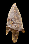 Arrowhead in cut stone with peduncle and wings. Neolithic period. North Africa. 4 cm.