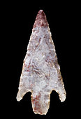 Arrowhead in cut stone with peduncle and wings. Neolithic period. North Africa. 3,2 cm.