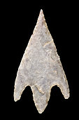 Arrowhead in cut stone with peduncle and wings. Neolithic period. North Africa. 3,1 cm.