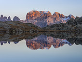 The summits of Brenta mountain range are reflected in Lago Nero. Brenta group in the Dolomites, part of UNESCO world heritage The Dolomites. Europe, Italy, Val Rendena