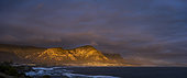 Evening view from Gearing's Point of the beautiful Kleinrivier Mountains bathed in the last glorious rays of sunlight. Hermanus, Whale Coast, Overberg, Western Cape, South Africa.