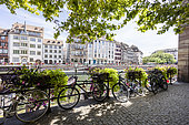 Soft mobility, cycling on the quays of Strasbourg in summer, Bas-Rhin, Alsace, France