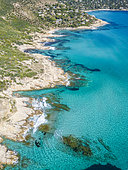 Aerial view of the coastline and turquoise waters between Cap Taillat and Pointe du Canadel with Escalet beach in the background, Ramatuelle, Var, French Riviera, France