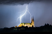 The cathedral and the storm. Thunderstorm over Voves seen from Chartres on the night of 2 to 3 September 2022, Eure-et-Loir, France