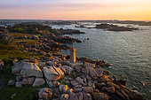 Aerial view of Ploumanach lighthouse, Mean Ruz, on the Pink Granite Coast, spring, Perros-Guirec, Côte d'Armor, Brittany, France