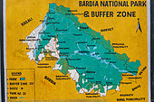 Information panel, map of the national park at the main entrance to the village of Thakurdwara, Bardia or Bardiya National Park, Terai Region, Nepal