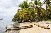 Monoxyle pirogue (built from a single piece of wood) on a heavenly beach at Hollandes Cayes in the San Blas region of Panama.