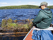 A few years ago, I and wildlife biologist Denis Masse, today retired, went on one of the 150 lakes of La Mauricie national park. Mr Masse worked for the park's conservation service and wanted to verify whether a pair of common loons has used one of the nesting rafts built here. These rafts are never submerged by water and they allow the loons to carry out the incubation of the eggs even if the water level rises on the lake during heavy rains. La Mauricie national park, Quebec. Canada